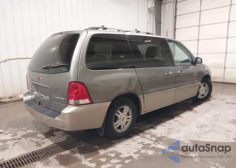 2004 Ford Freestar Limited z USA, uszkodzony, nr VIN 2FMZA58284BB23844